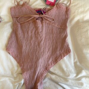 Never worn! Edikted pink bodysuit!